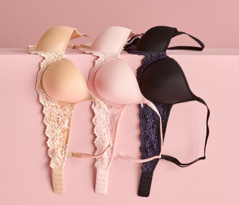 Three bras: one beige, one pink, and one black
