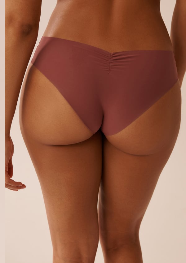 Dark pink Be free panties seen from behind.