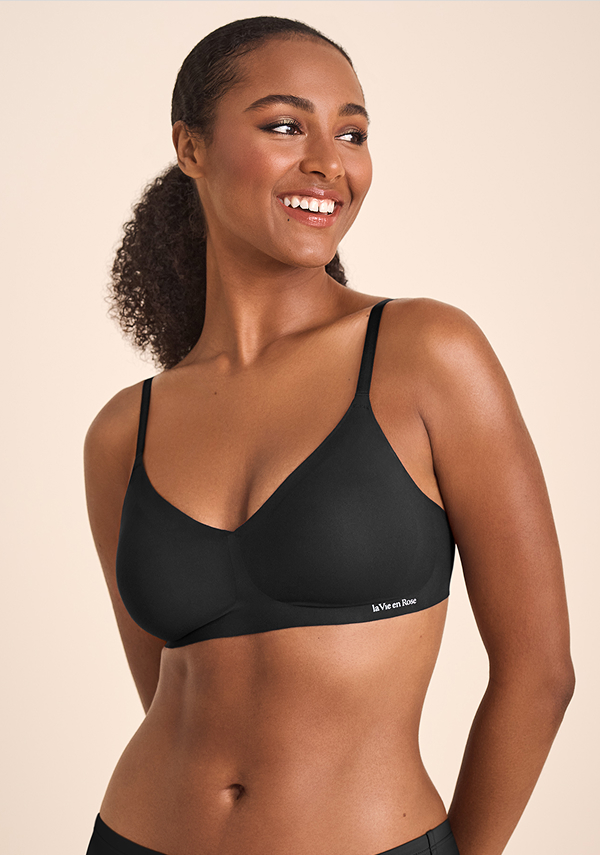 Model wearing a black bralette