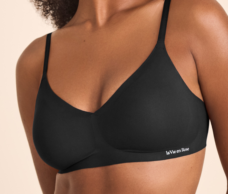 Model wearing a black bralette