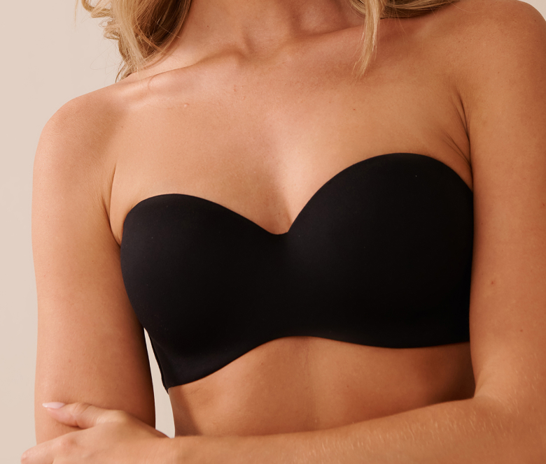 Model wearing a black convertible bra