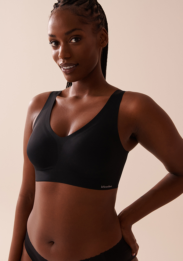 Model wearing a black lounge bra