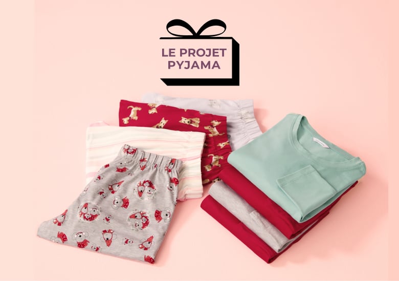 Several pajamas in various colors, folded on a pink background