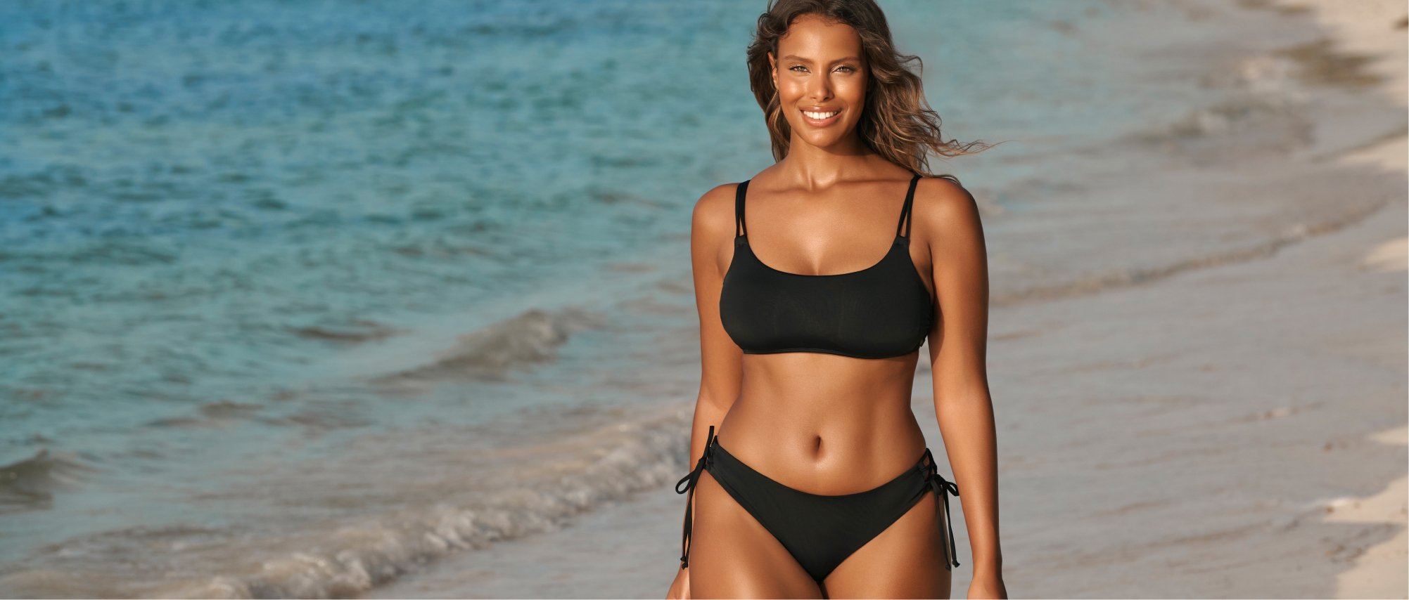 IRRESISTIBLE FROM EVERY ANGLE: THE BLACK BIKINI AND ONE-PIECE SWIMSUITS