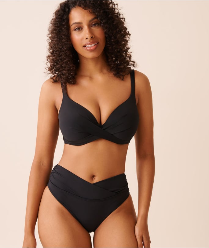 Model wearing a black bikini