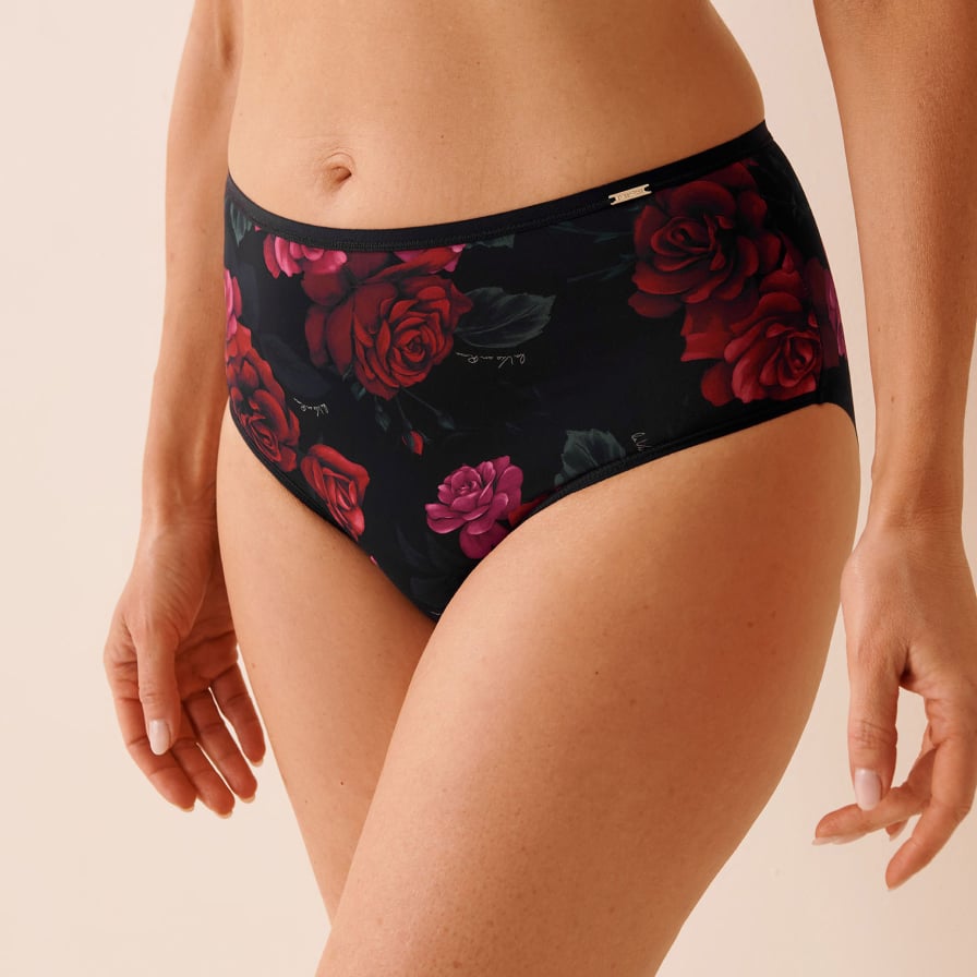 High-waist black panties with red rose details.