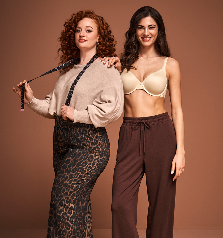 Model and bra expert posing together
