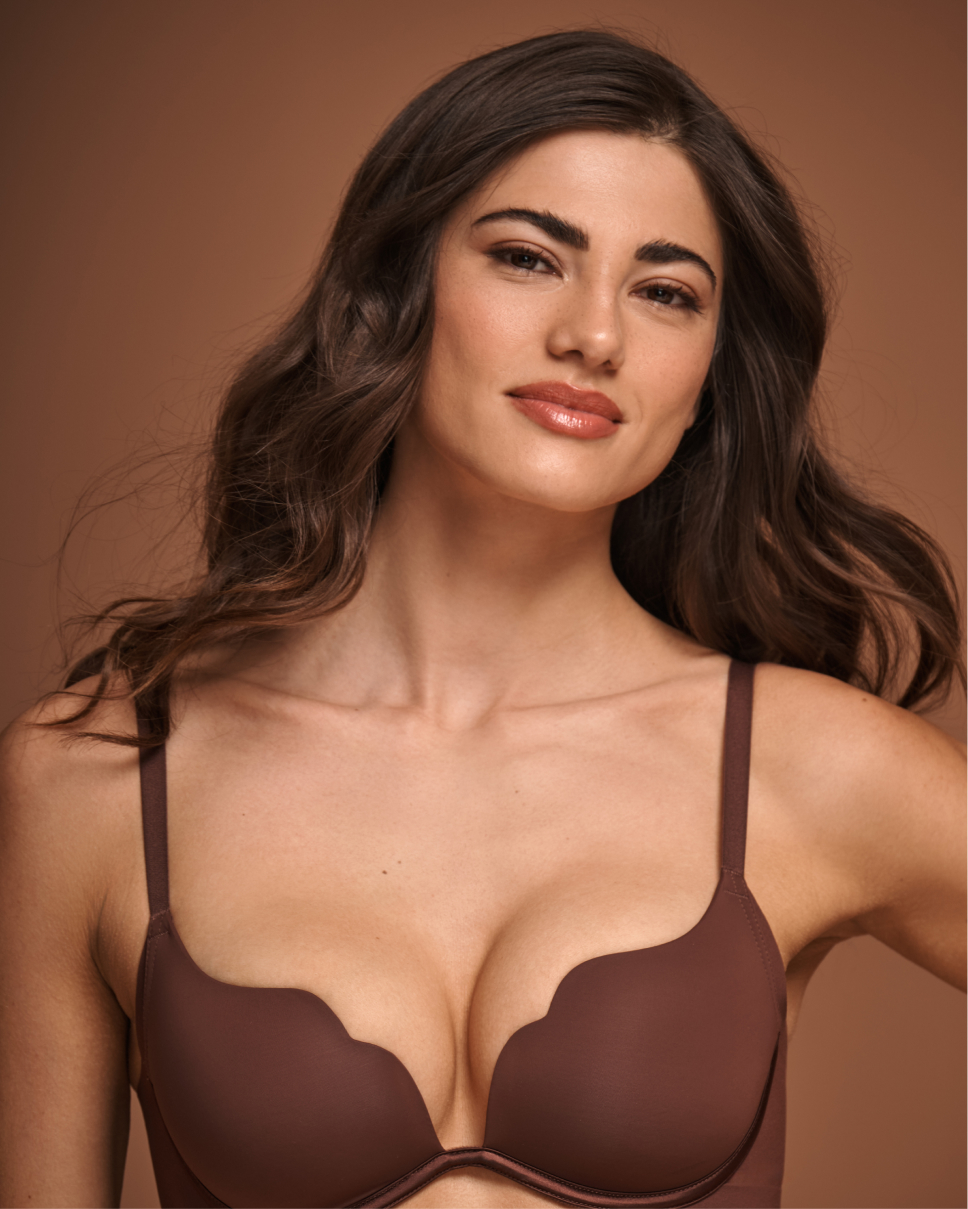 Model wearing a brown satin push-up scalloped bra