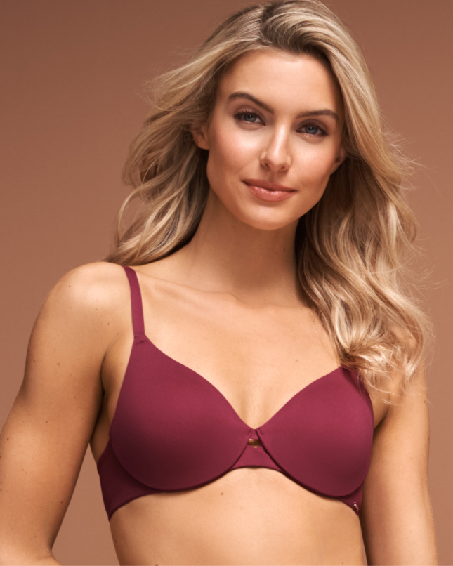 Model wearing a raspberry-red cushioned wire bra