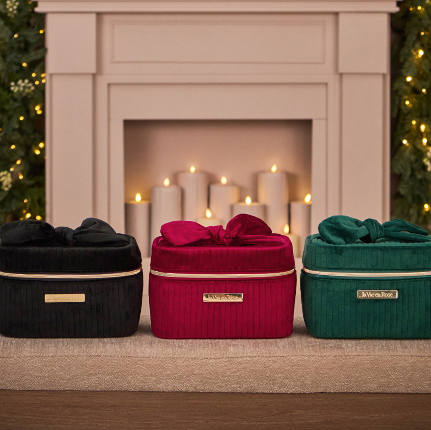 Three cosmetic bags: one black, one red, and one green