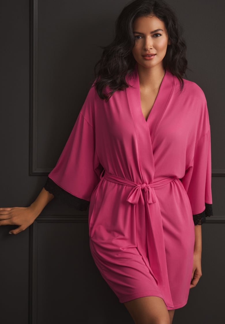 Modeling wearing a pink kimono