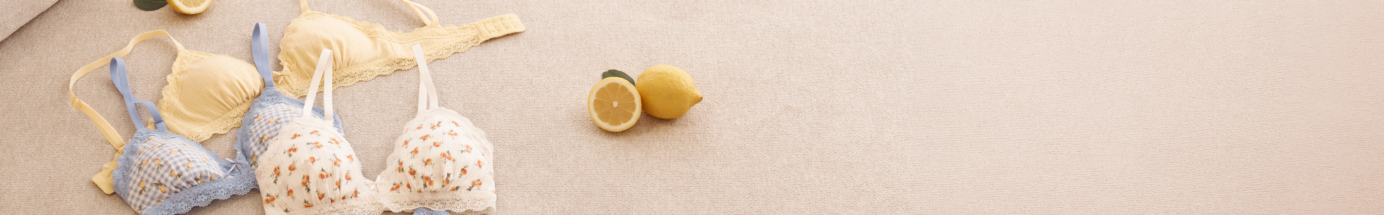 Three cotton bralettes featuring fruit and checkered patterns