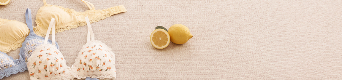 Three cotton bralettes featuring fruit and checkered patterns