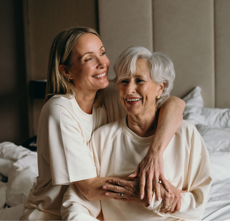 Liv Judd and her mother posing in yellow loungewear