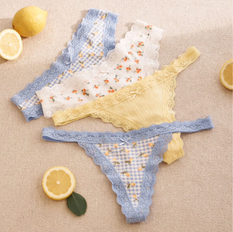 Various panties in different styles, colors, and details laid out side by side.