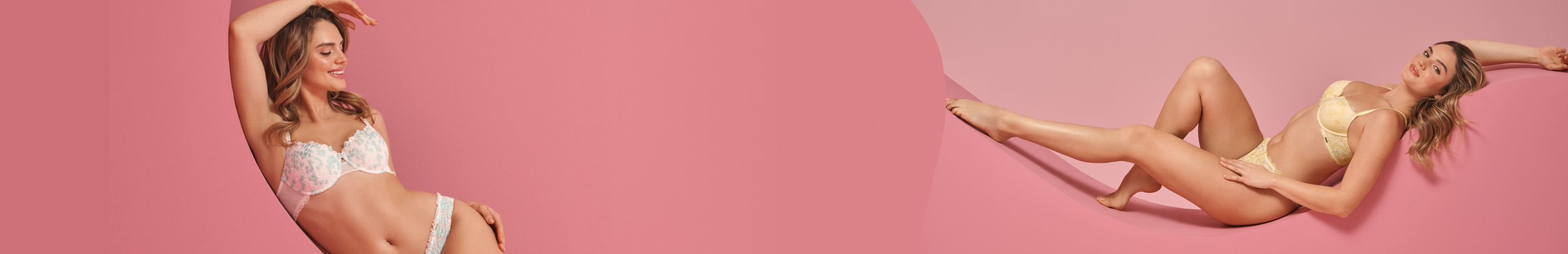 Two models wearing flexible bras, lying on rounded shapes.