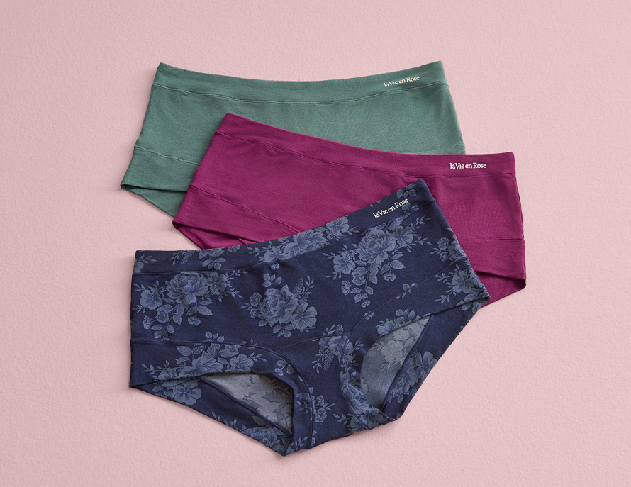 three pairs of panties: one blue, one pink, and one green