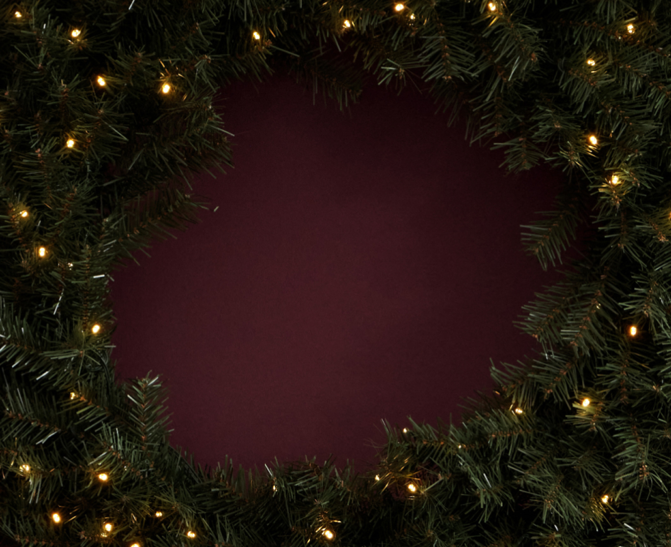 Perks listed on a Christmas wreath background