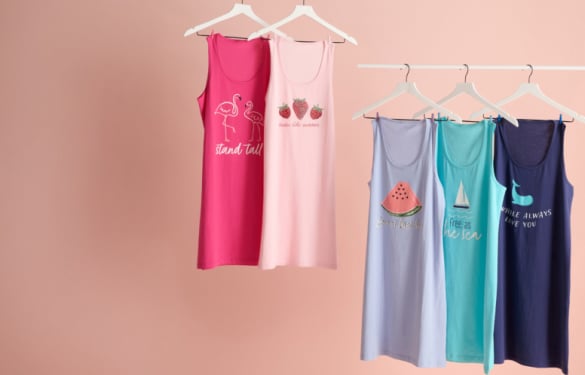 Five sleepshirts on hangers, pink and blue tones