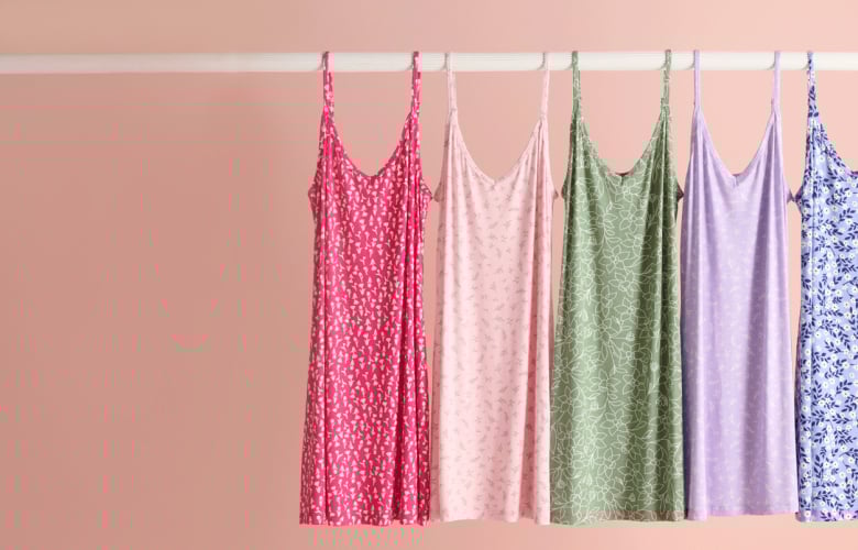 Six colourful nighties hanging, showcasing the styles available in our outlet sale.