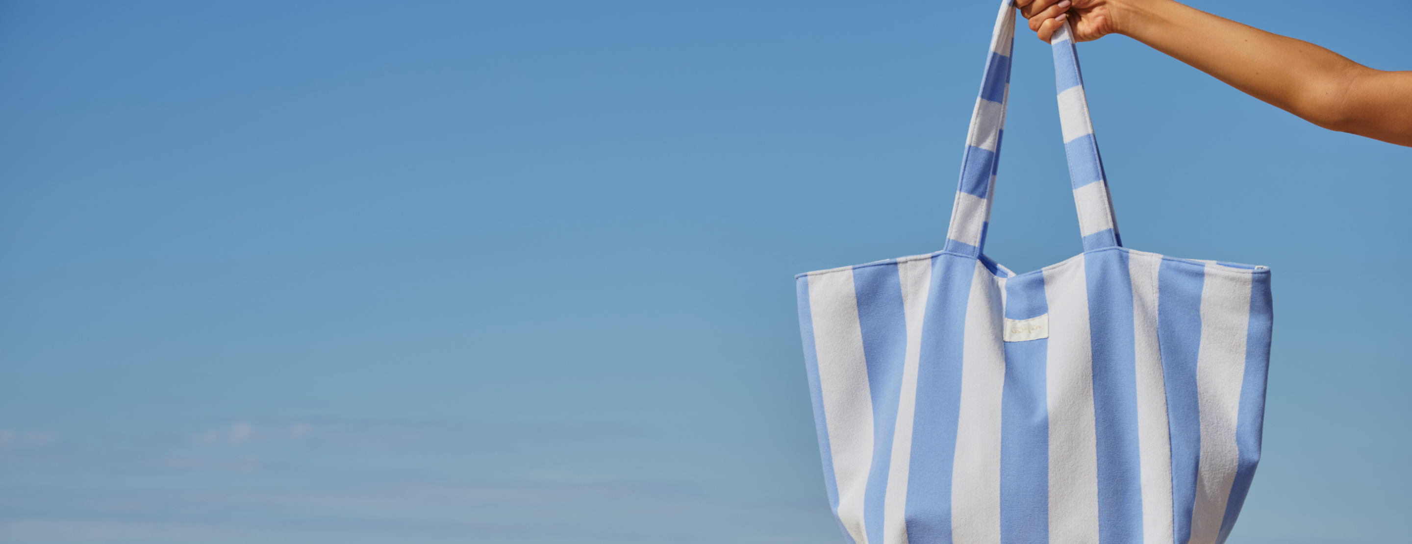 White and blue striped beach bag
