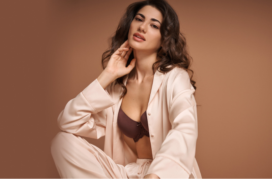Model wearing a beige loungewear set