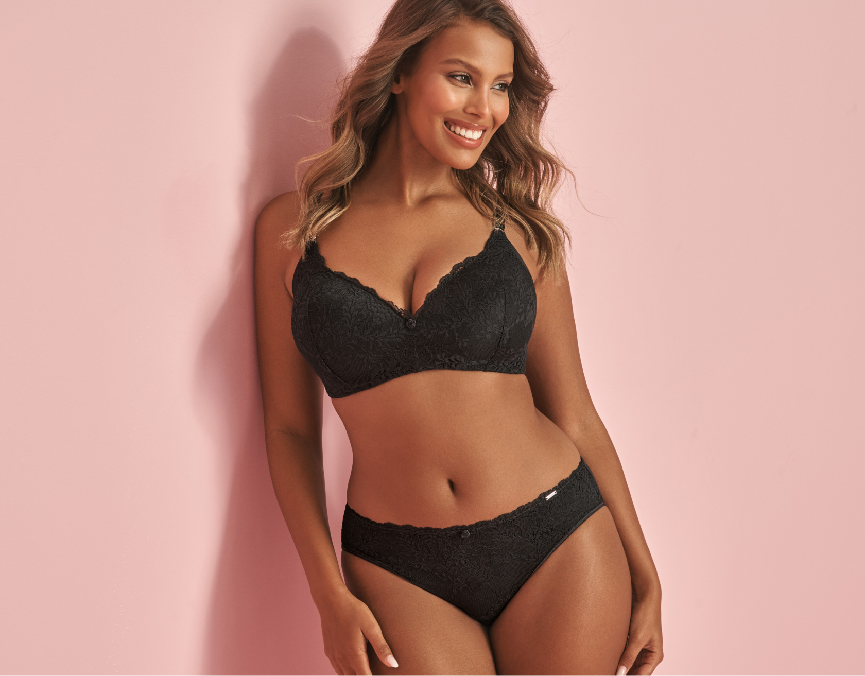 Model wearing a blue bra and panty set