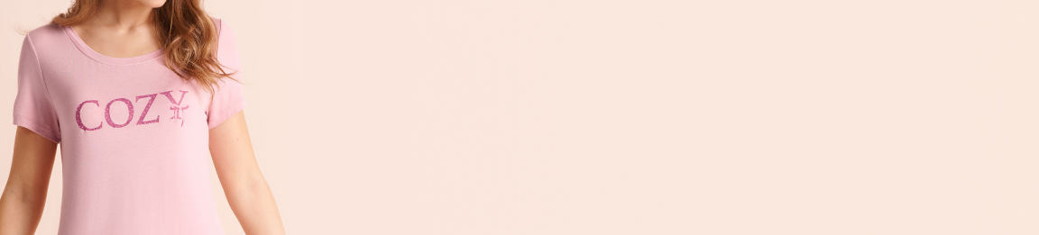 Model wearing pale pink pajamas