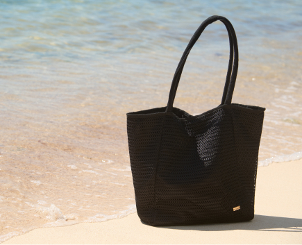 Beach accessories laid out by the poolside