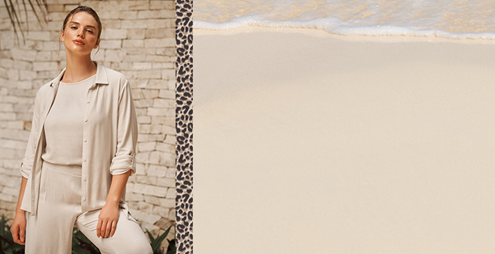 Model wearing a white textured tankini and matching swim bottoms