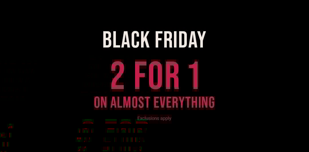 Plush bathrobes in soft tones, folded or tied.