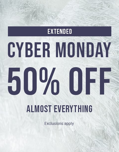 Model seen from behind wearing a textured pink bodysuit with an open back and a large bow at the waist.