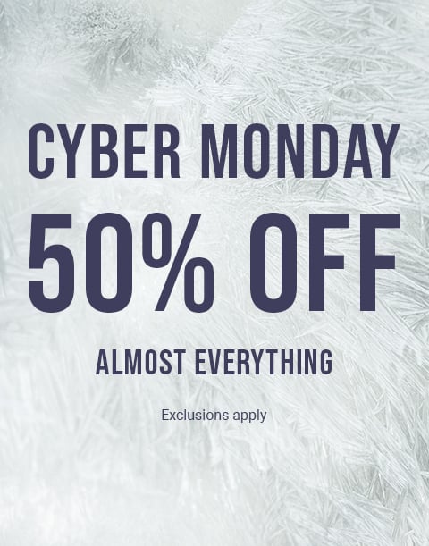 Model seen from behind wearing a textured pink bodysuit with an open back and a large bow at the waist.