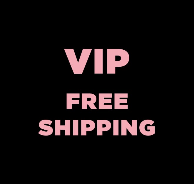 Two lounge bras lying on a blanket, one red, the other green.