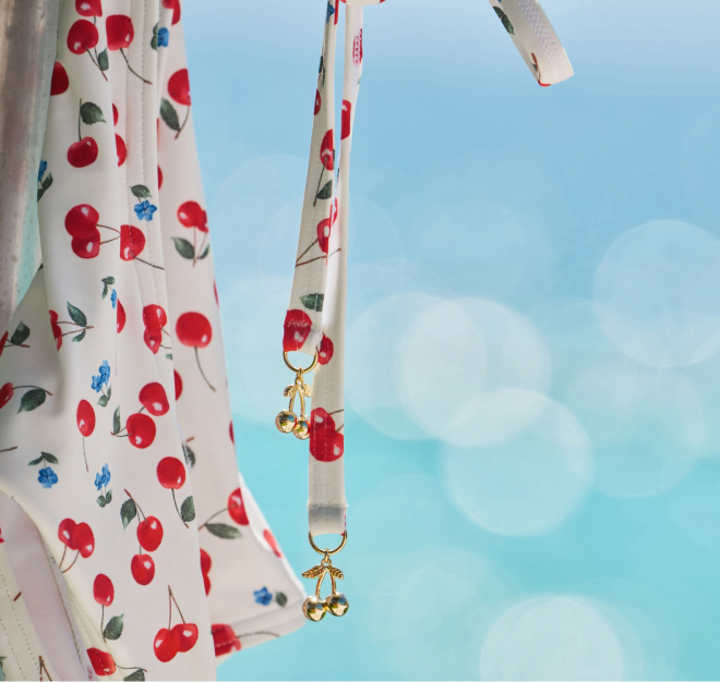 White cherry-print swimsuit bottoms