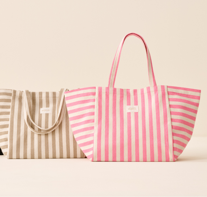 Beach bags—one in white and beige stripes, the other in white and pink