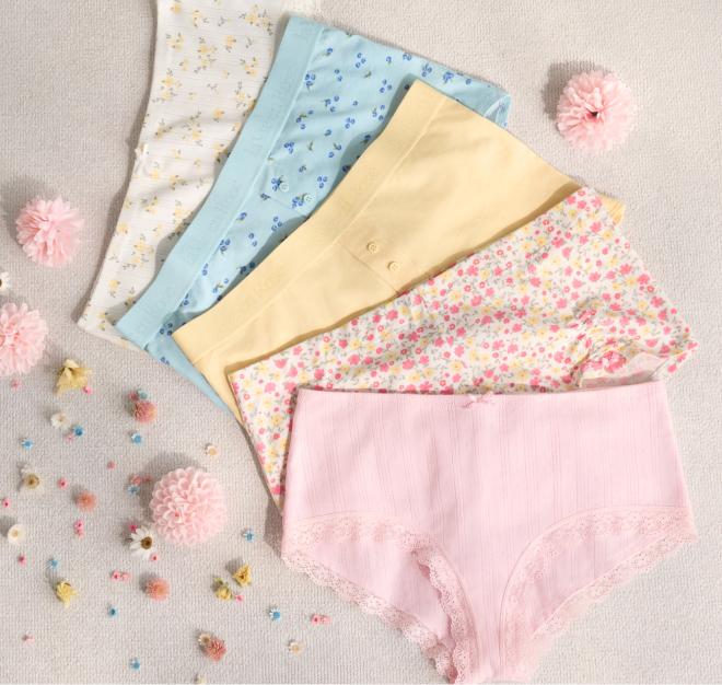 A collection of travel accessories in biege.