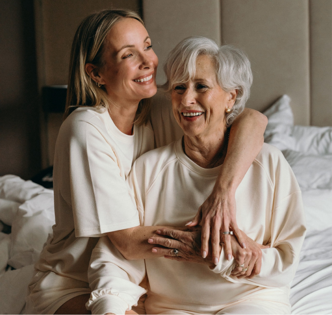 Liv Judd and her mother posing in yellow loungewear