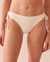 LA VIE EN ROSE AQUA Bas de bikini noué aux hanches texturé Pois blanc crème 70300491 - View1