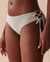 LA VIE EN ROSE AQUA Bas de bikini cheeky noué texturé en fibres recyclées Vert gris clair 70300522 - View1